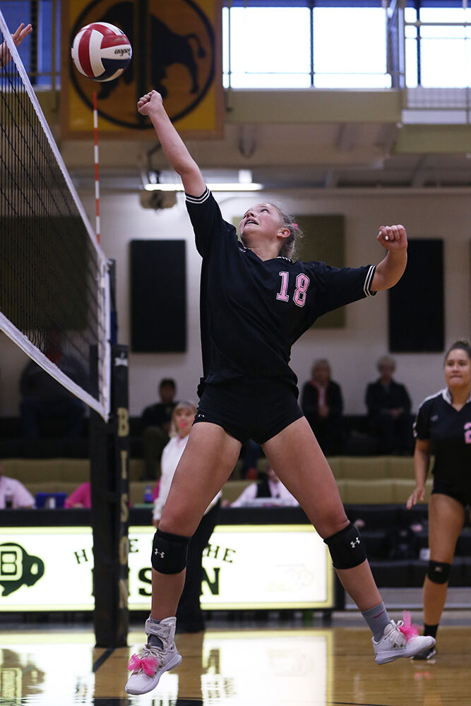 Holland Stowe punched the ball over after a close pass to the net